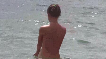 Nudistas nus na praia