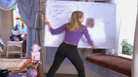 Melissa Joan Hart - Um rabo bem redondo e volumoso em calças pretas justas