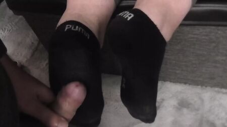 meias sujas pretas da Puma