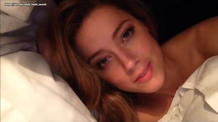 Amber Heard - Vídeo de nudez no iCloud